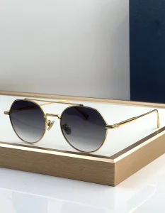 Retro Steampunk Round Sunglasses with Metal Frame and UV400 Protection for Men and Women